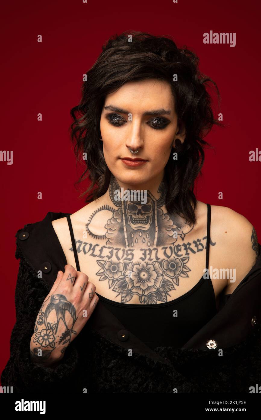 Portrait of transgender woman with tattoos and piercings Stock Photo