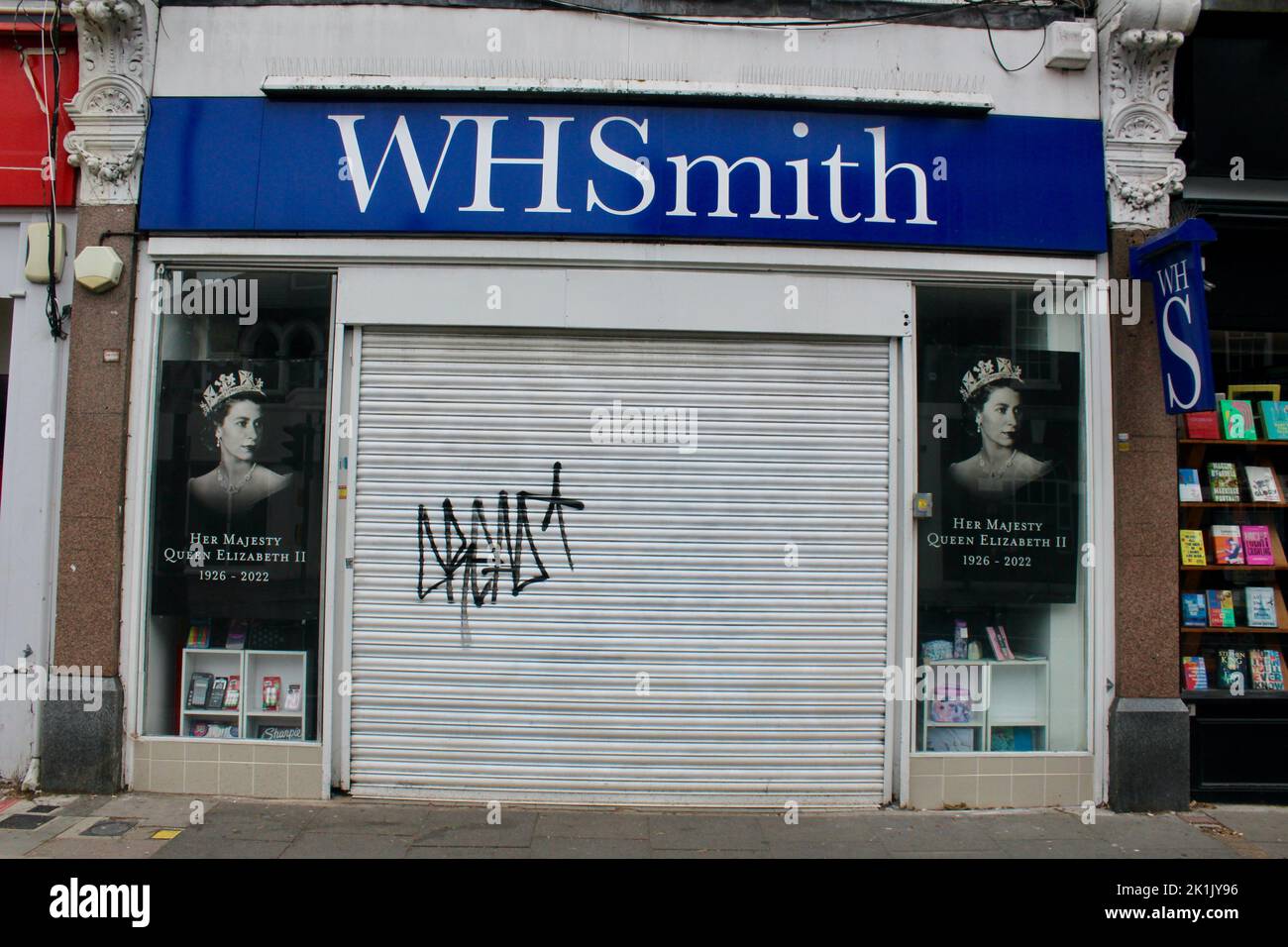 WH Smith shop window displays and closed signs in muswell hill on 19th september 2022 for the Queen Elizabeth 2 funeral tribute and commemoration Stock Photo