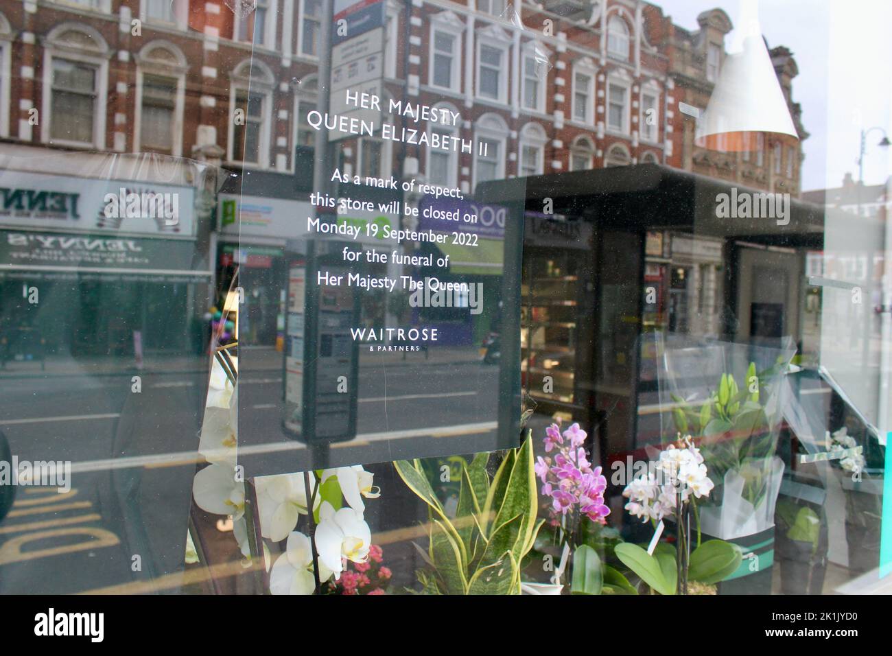 waitrose shop window displays and closed signs in muswell hill on 19th september 2022 for the Queen Elizabeth 2 funeral tribute and commemoration Stock Photo