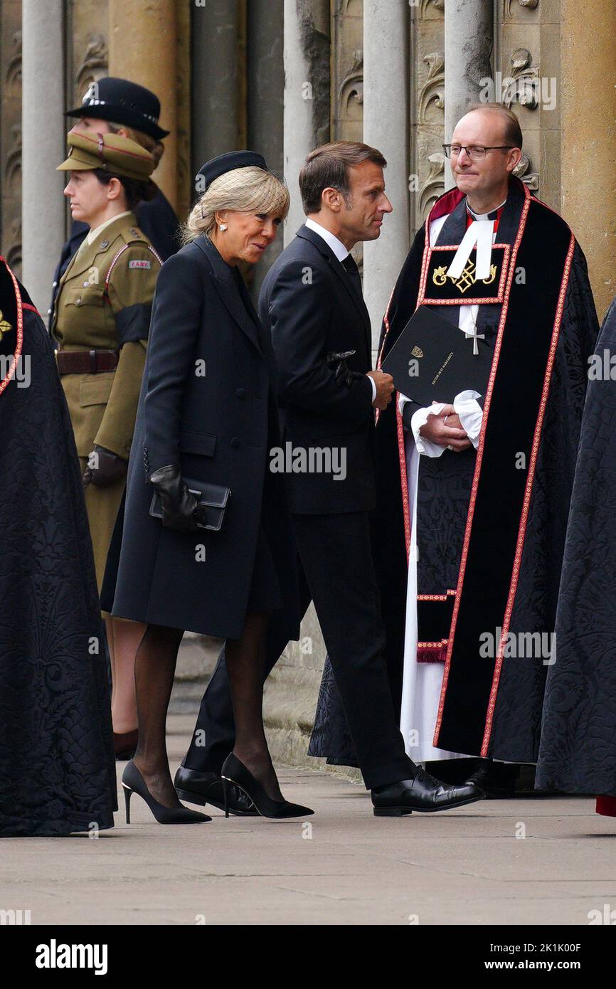 France's President Emmanuel Macron and first lady Brigitte Macron arriving at the State Funeral of Queen Elizabeth II, held at Westminster Abbey, London. Picture date: Monday September 19, 2022. Stock Photo