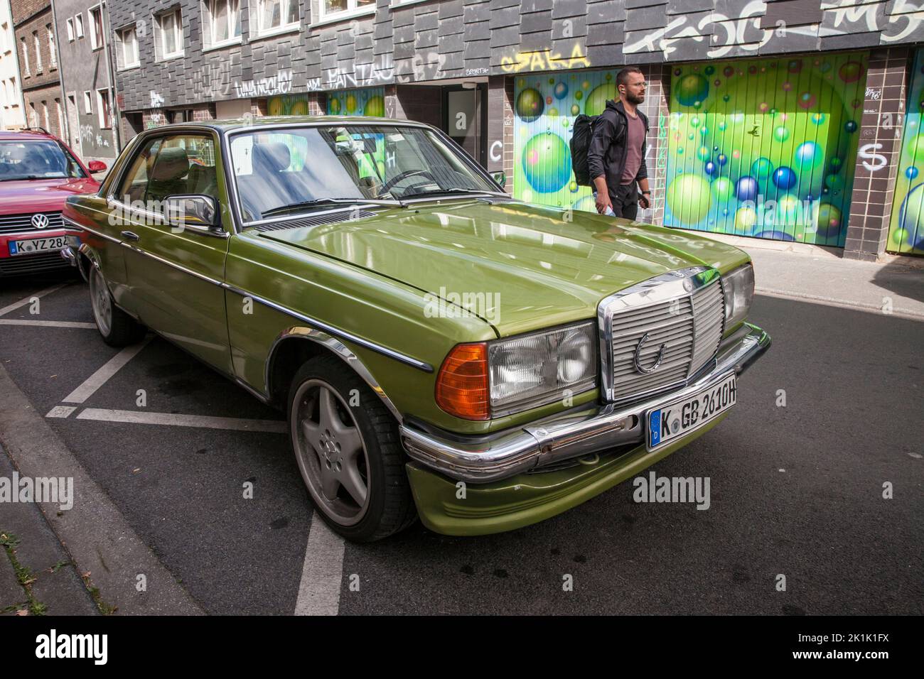 Mercedes-Benz Coupe C 123 in Ehrenfeld district, Cologne, Germany. Mercedes-Benz Coupe C 123 im Stadtteil Ehrenfeld, Koeln, Deutschland. Stock Photo