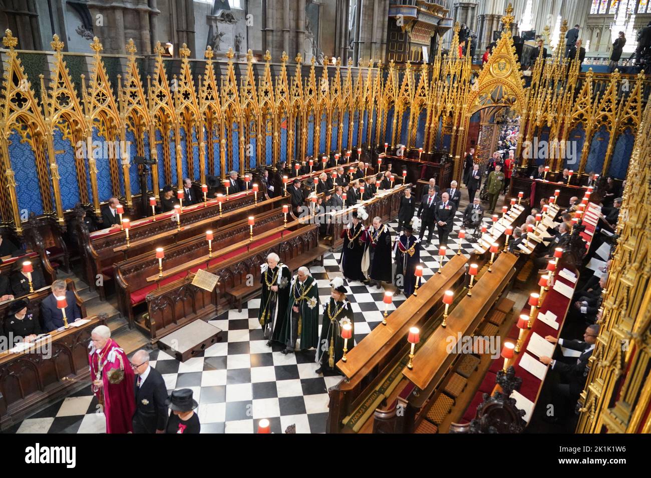 Guests arrive at the State Funeral of Queen Elizabeth II, held at Westminster Abbey, London. Picture date: Monday September 19, 2022. Stock Photo