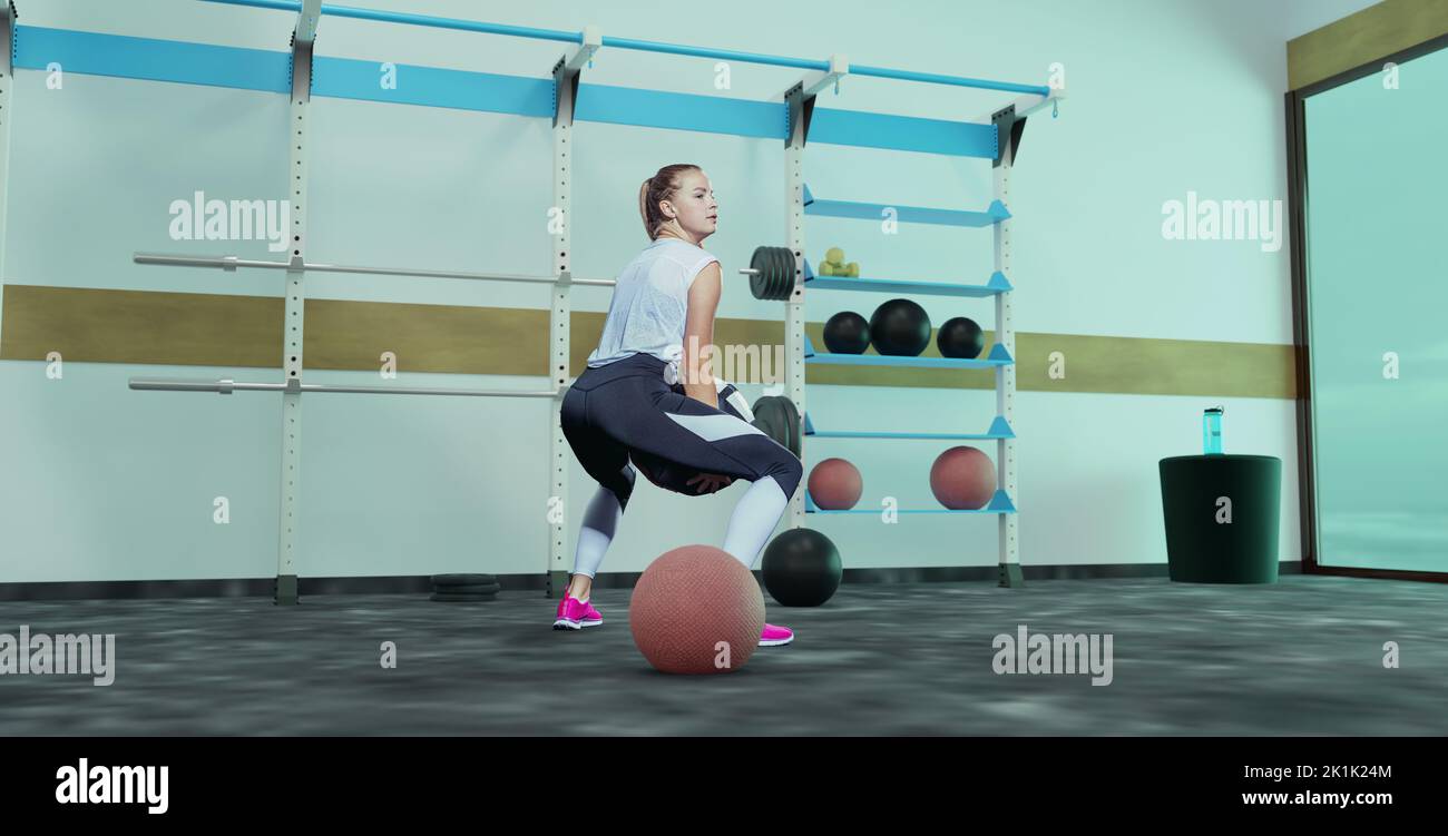 young woman at atletic work out at the gym or in the fitness room Stock Photo