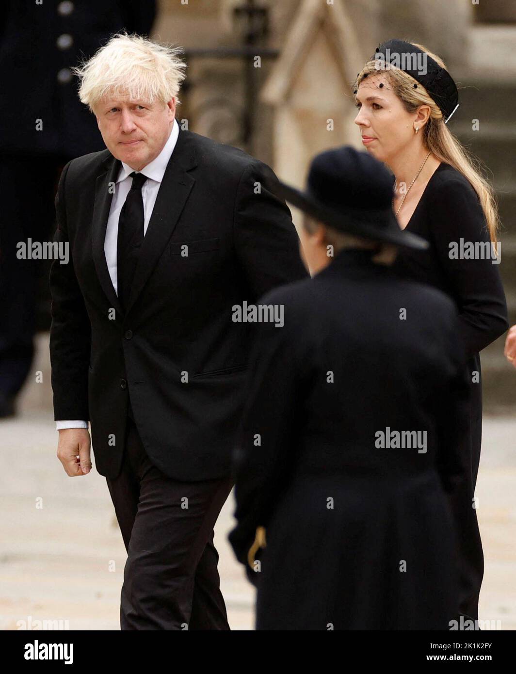 Former British Prime Minister Boris Johnson and his wife Carrie Johnson arrive at Westminster Abbey, on the day of the state funeral and burial of Britain's Queen Elizabeth, in London, Britain, September 19, 2022  REUTERS/John Sibley Stock Photo
