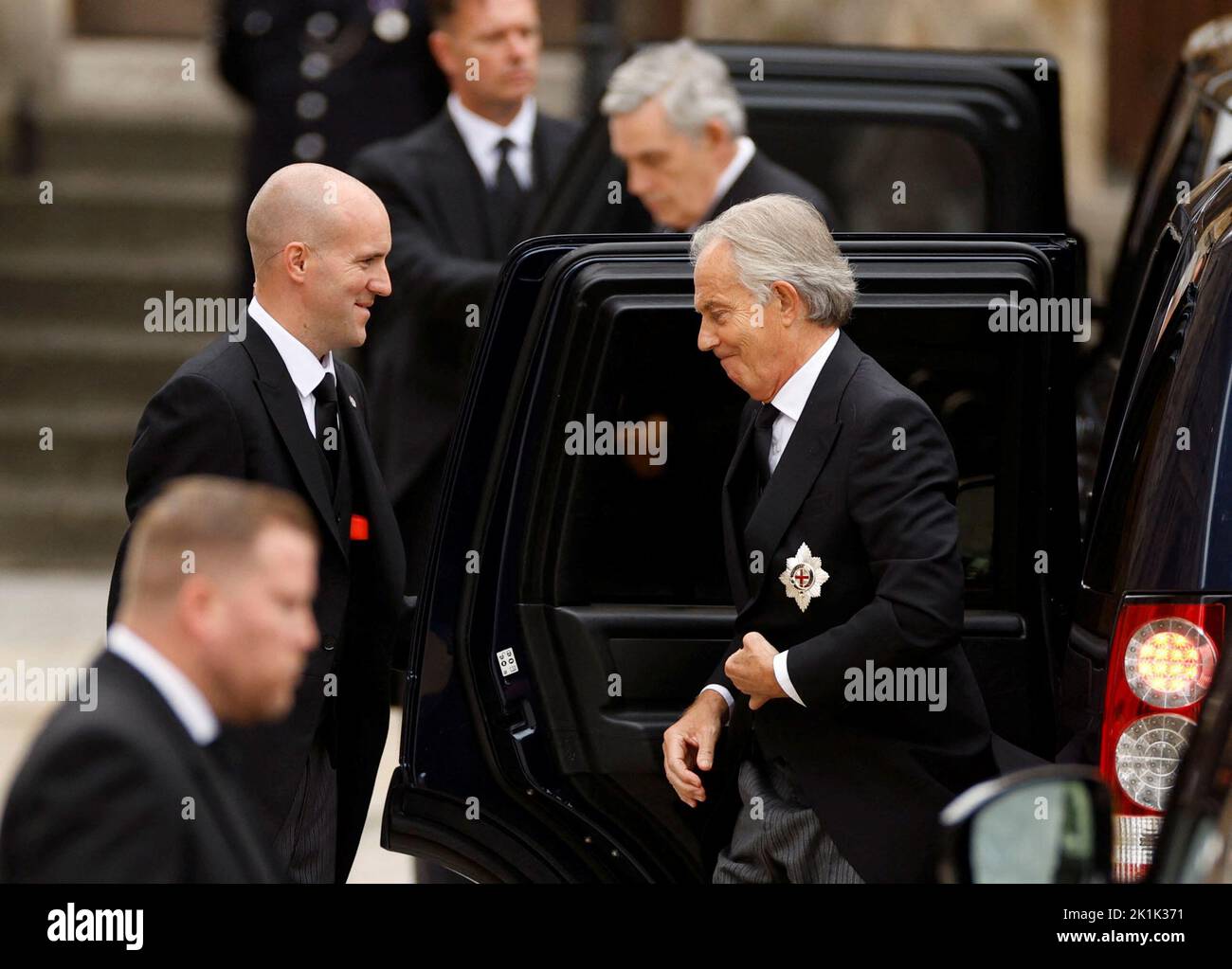 Former British Prime Ministers Tony Blair and Gordon Brown arrive at Westminster Abbey on the day of the state funeral and burial of Britain's Queen Elizabeth, in London, Britain, September 19, 2022   REUTERS/John Sibley Stock Photo