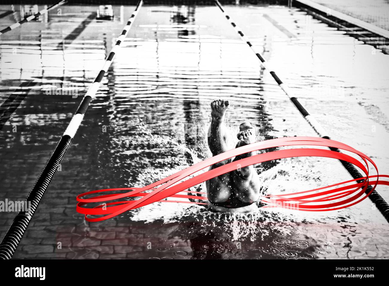 Grey line design against swimmer plunging in the pool Stock Photo
