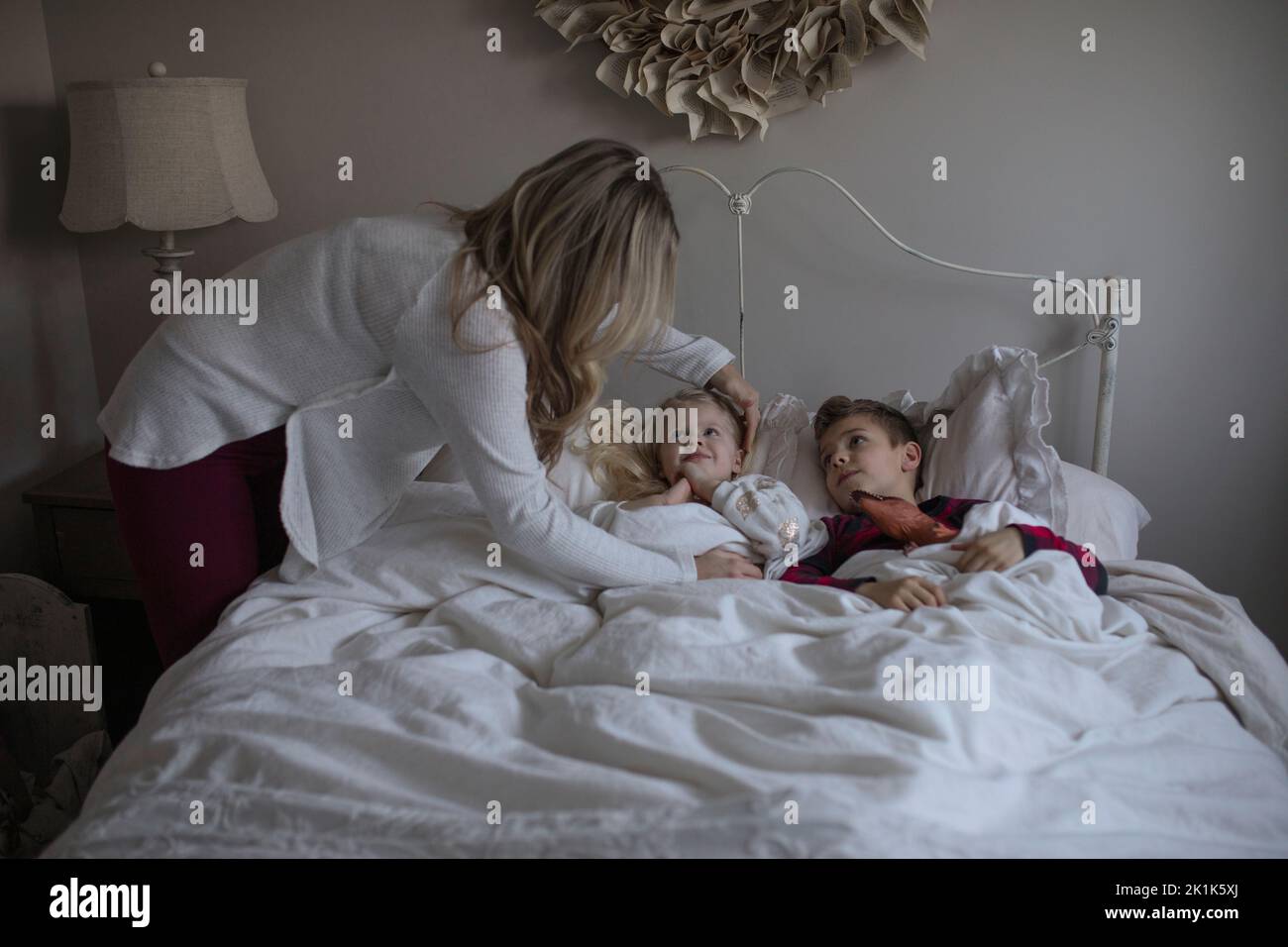 Tucking in child night hires stock photography and images Alamy