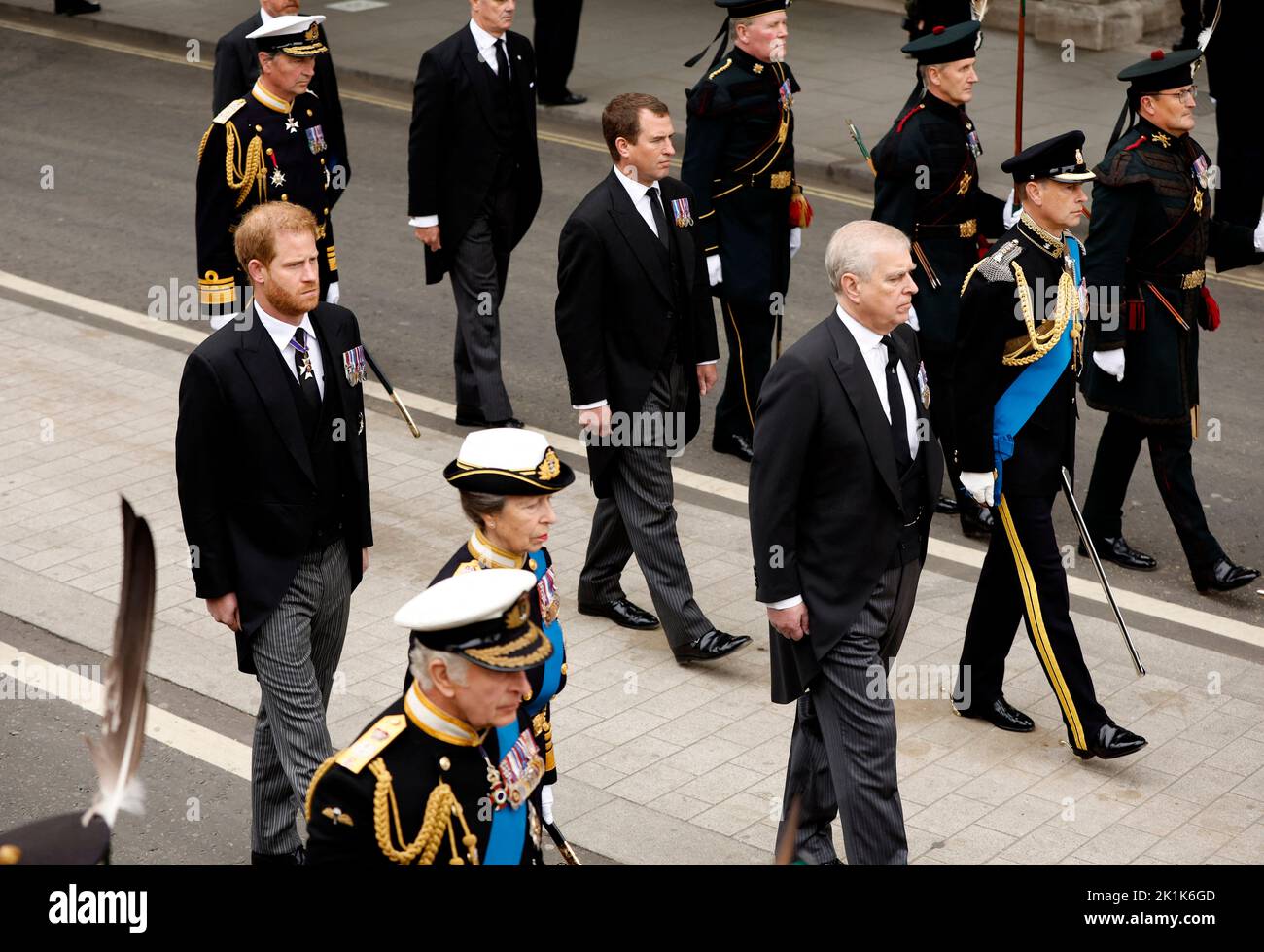 Britain's King Charles, walks to to Westminster Abbey alongside Britain's Anne, Princess Royal, Britain's Prince Andrew and Britain's Prince Harry, Duke of Sussex, on the day of the state funeral and burial of Britain's Queen Elizabeth, in London, Britain, September 19, 2022 REUTERS/John Sibley Stock Photo