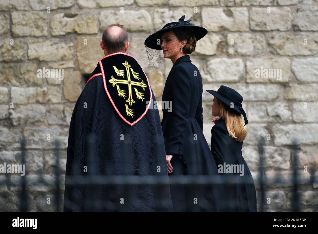 The Princess of Wales (centre) and Princess Charlotte arriving at the State Funeral of Queen Elizabeth II, held at Westminster Abbey, London. Picture date: Monday September 19, 2022. Stock Photo