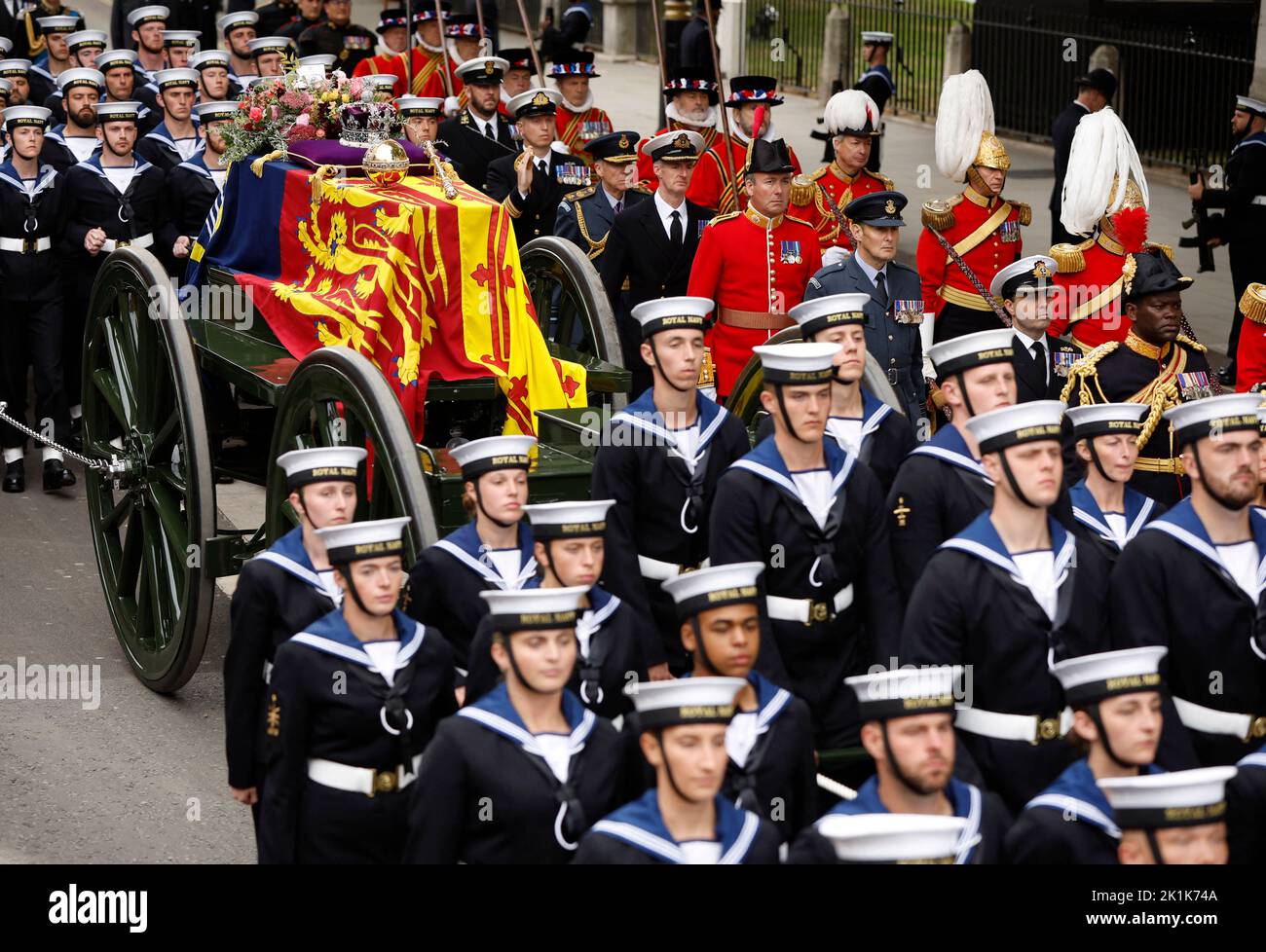 The coffin of Britain's Queen Elizabeth is carried in the procession to Westminster Abbey on the day of the state funeral and burial of Britain's Queen Elizabeth, in London, Britain, September 19, 2022 REUTERS/John Sibley Stock Photo