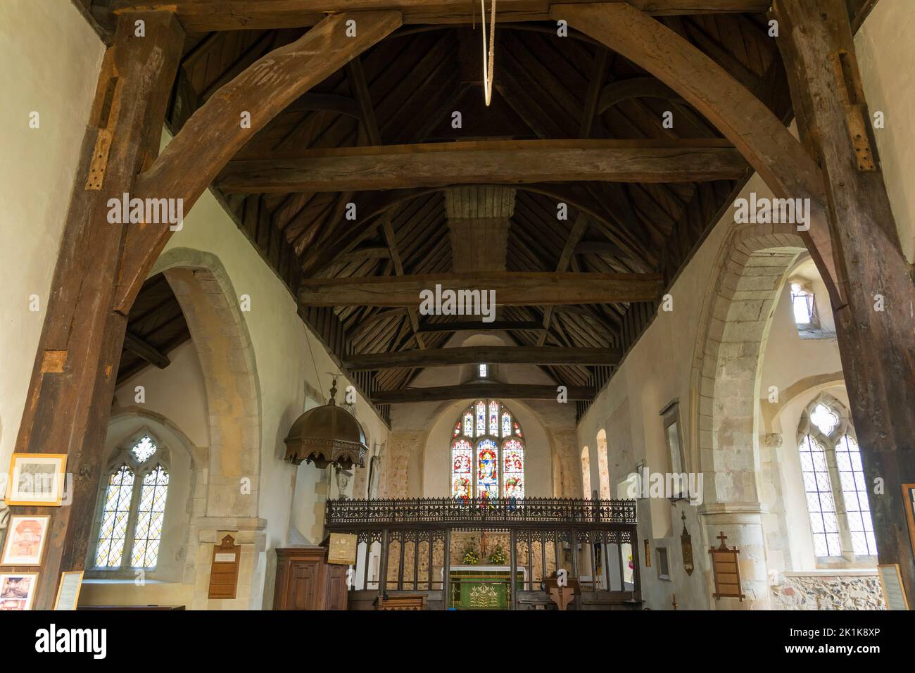 The interior of St Mary the Virgin with a collar braced wooden roof, a 12th-century country church  standing inside Silchester Roman city. UK Stock Photo
