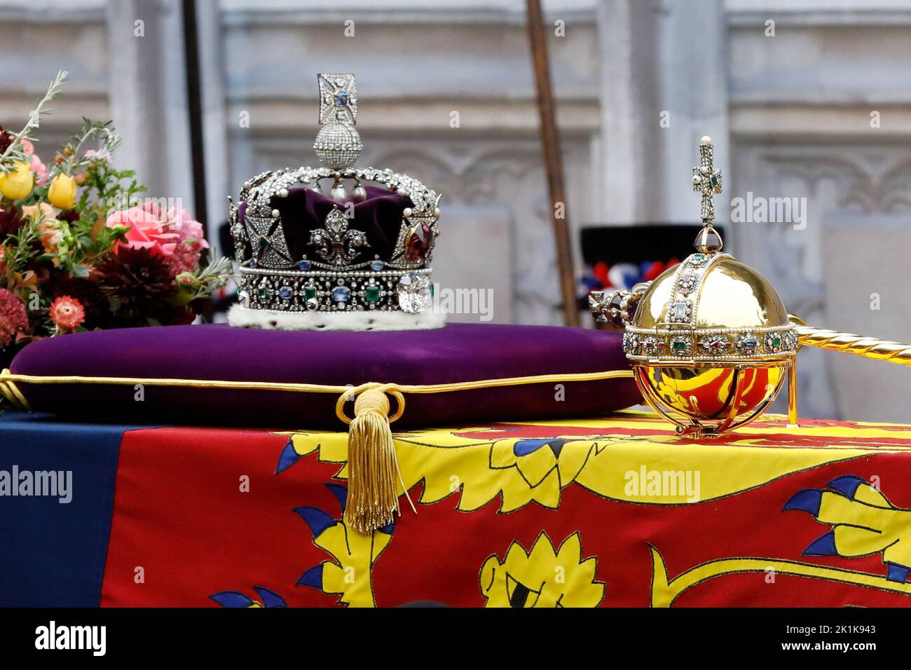 The coffin of Queen Elizabeth II, draped in the Royal Standard with the