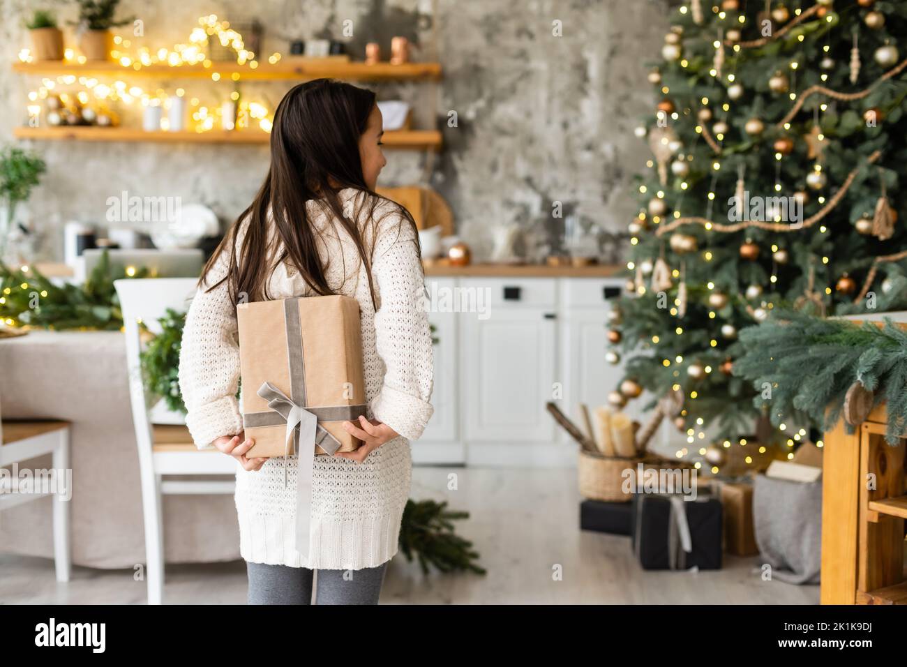 Happy little smiling girl with christmas gift box Stock Photo - Alamy