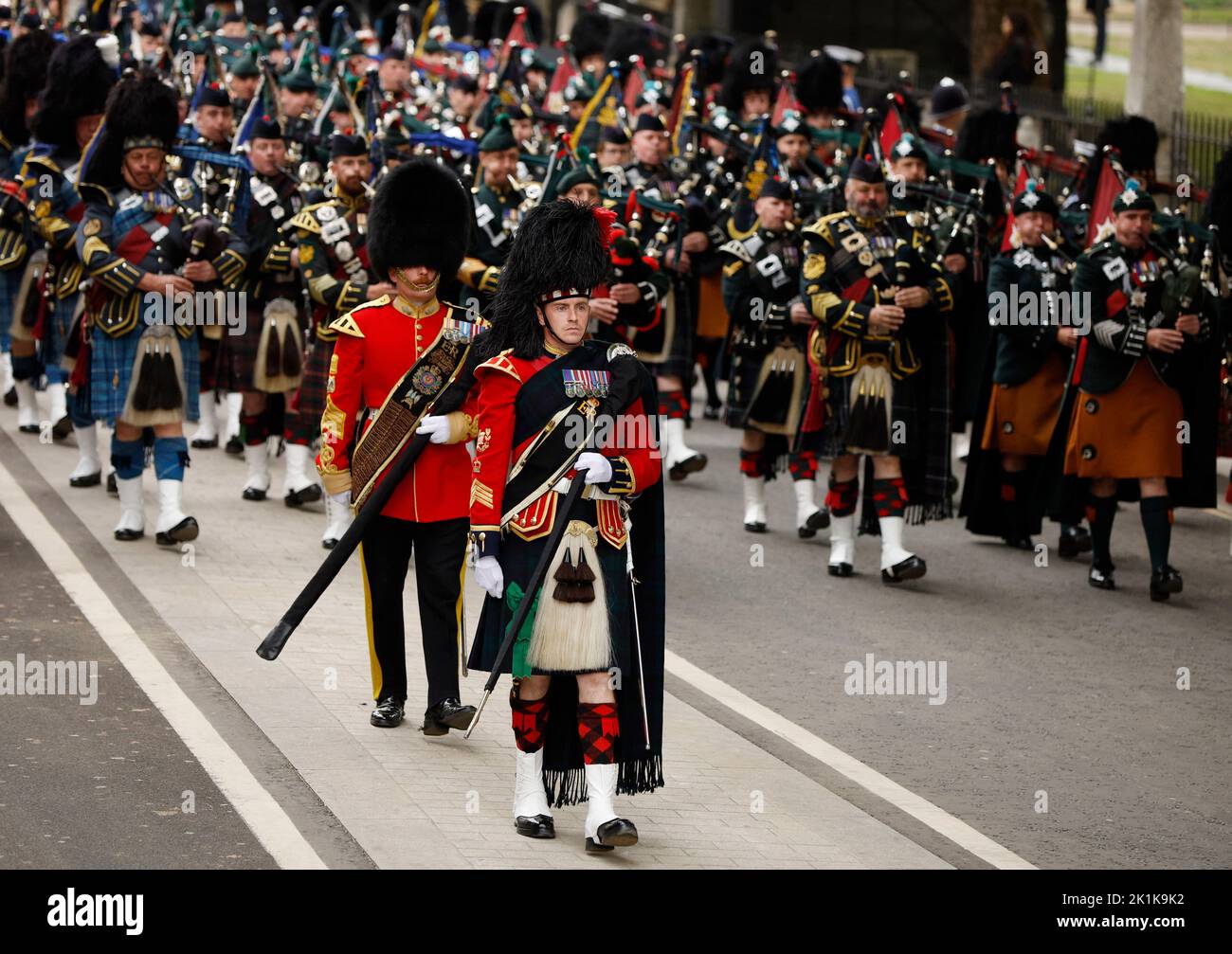 Pipers and drummers are seen in the funeral procession to Westminster Abbey on the day of state funeral and burial of Britain's Queen Elizabeth, in London, Britain, September 19, 2022 REUTERS/John Sibley Stock Photo