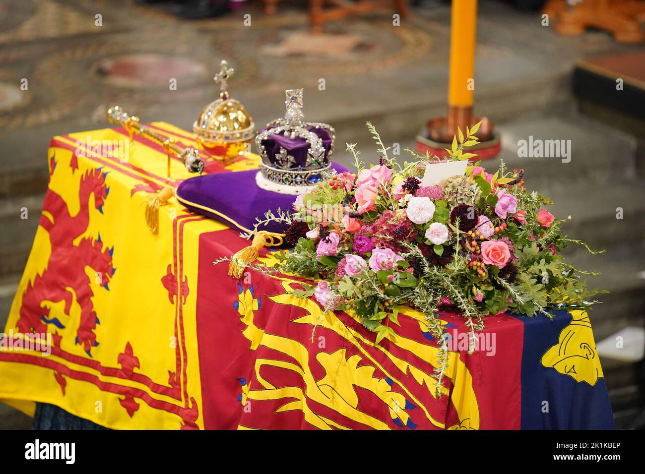 The coffin of Queen Elizabeth II, draped in the Royal Standard with the Imperial State Crown and the Sovereign's Orb and Sceptre, during her State Funeral at the Abbey in London. Picture date: Monday September 19, 2022. Stock Photo