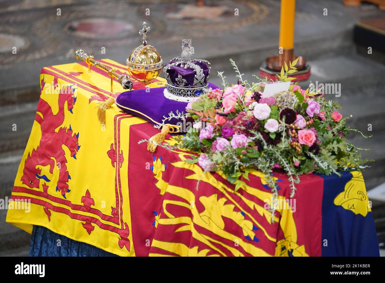 The coffin of Queen Elizabeth II, draped in the Royal Standard with the Imperial State Crown and the Sovereign's Orb and Sceptre, during her State Funeral at the Abbey in London. Picture date: Monday September 19, 2022. Stock Photo