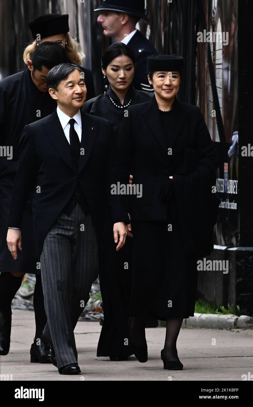 Emperor of Japan Naruhito (centre) and wife Empress Masako arrive at