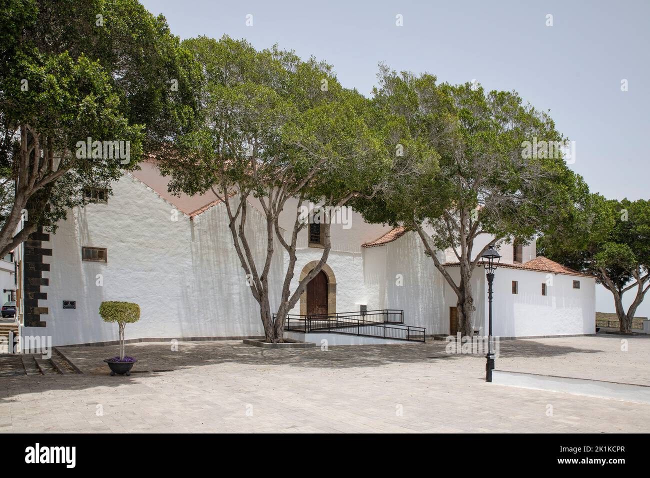 Parroquia de San Miguel Arcangel or the Parish Saint Michael the Archangel, local church built in a Baroque style and surrounded by a large parvis Stock Photo