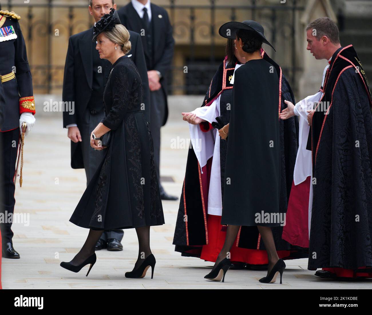 The Countess of Wessex (left) and the Duchess of Sussex arriving at the State Funeral of Queen Elizabeth II, held at Westminster Abbey, London. Picture date: Monday September 19, 2022. Stock Photo