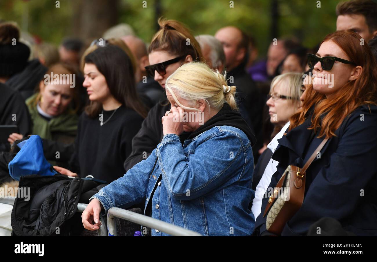 Members of the public in the crowd on The Mall, central London ahead of the State Funeral of Queen Elizabeth II. Picture date: Monday September 19, 2022. Stock Photo