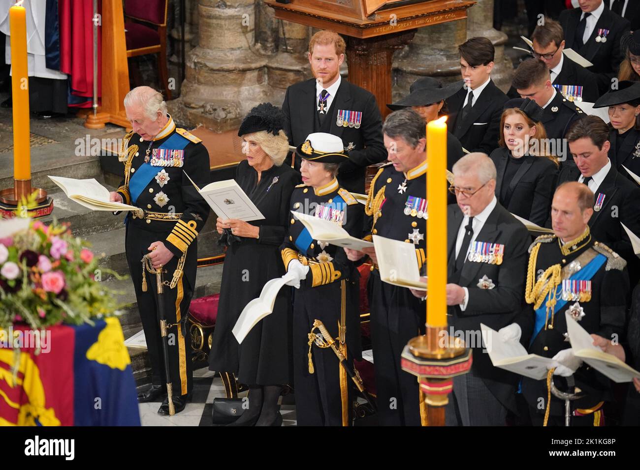 (front row) King Charles III, the Queen Consort, the Princess Royal, Vice Admiral Sir Tim Laurence, the Duke of York, the Earl of Wessex, (second row) the Duke of Sussex, the Duchess of Sussex, Princess Beatrice, Edoardo Mapelli Mozzi and (third row) Samuel Chatto, Arthur Chatto, Lady Sarah Chatto, in front of the coffin of Queen Elizabeth II during her State Funeral at the Abbey in London. Picture date: Monday September 19, 2022. Stock Photo