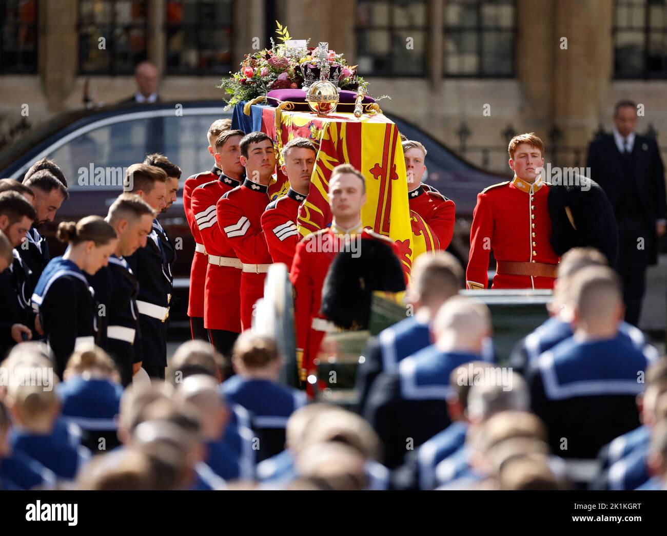 Pallbearers carry the coffin of Britain's Queen Elizabeth out of Westminster Abbey on the day of the state funeral and burial of Britain's Queen Elizabeth, in London, Britain, September 19, 2022 REUTERS/John Sibley Stock Photo