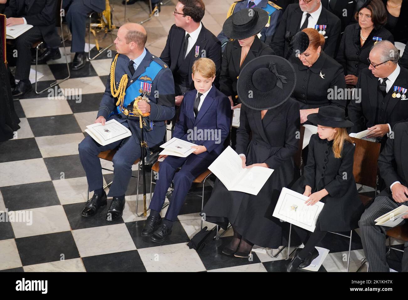 (front row) The Prince of Wales, Prince George, the Princess of Wales, and Princess Charlotte, (second row) Jack Brooksbank , Princess Eugenie, Sarah, Duchess of York and the Earl of Snowdon during the State Funeral of Queen Elizabeth II at the Abbey in London. Picture date: Monday September 19, 2022. Stock Photo