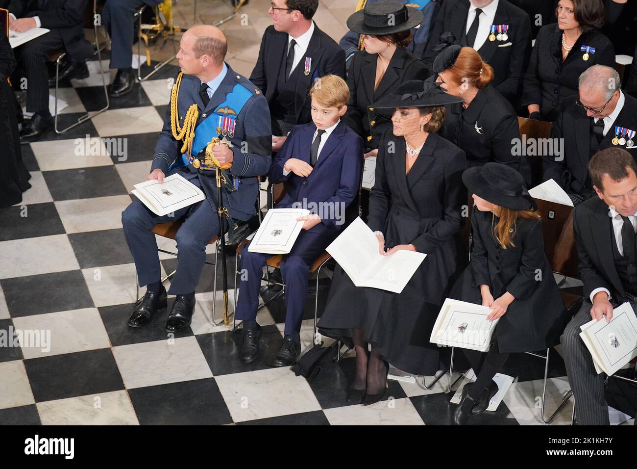 (front row) The Prince of Wales, Prince George, the Princess of Wales, and Princess Charlotte, (second row) Jack Brooksbank , Princess Eugenie, Sarah, Duchess of York and the Earl of Snowdon during the State Funeral of Queen Elizabeth II at the Abbey in London. Picture date: Monday September 19, 2022. Stock Photo