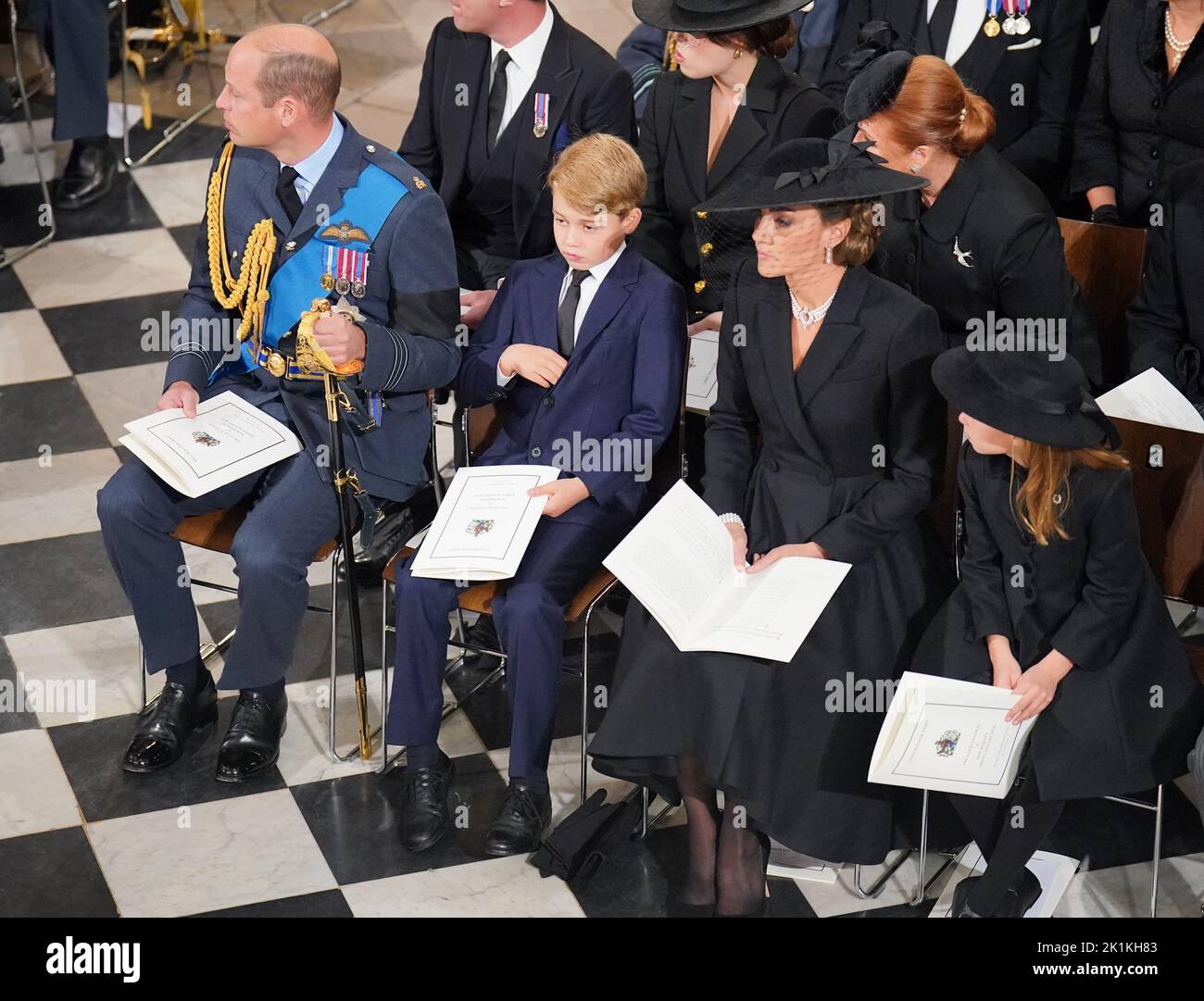 (front row) The Prince of Wales, Prince George, the Princess of Wales and Princess Charlotte during the State Funeral of Queen Elizabeth II at the Abbey in London. Picture date: Monday September 19, 2022. Stock Photo