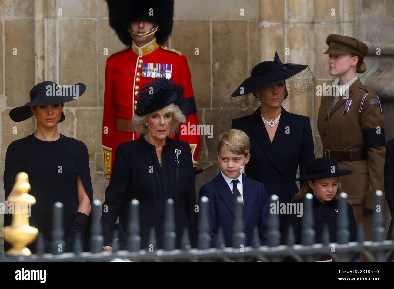 Britain's Queen Camilla along with Britain's Catherine, Princess of Wales, Britain's Meghan, Duchess of Sussex, Prince George and Princess Charlotte attend the state funeral and burial of Britain's Queen Elizabeth at Westminster Abbey, in London, Britain, September 19, 2022.  REUTERS/Kai Pfaffenbach Stock Photo