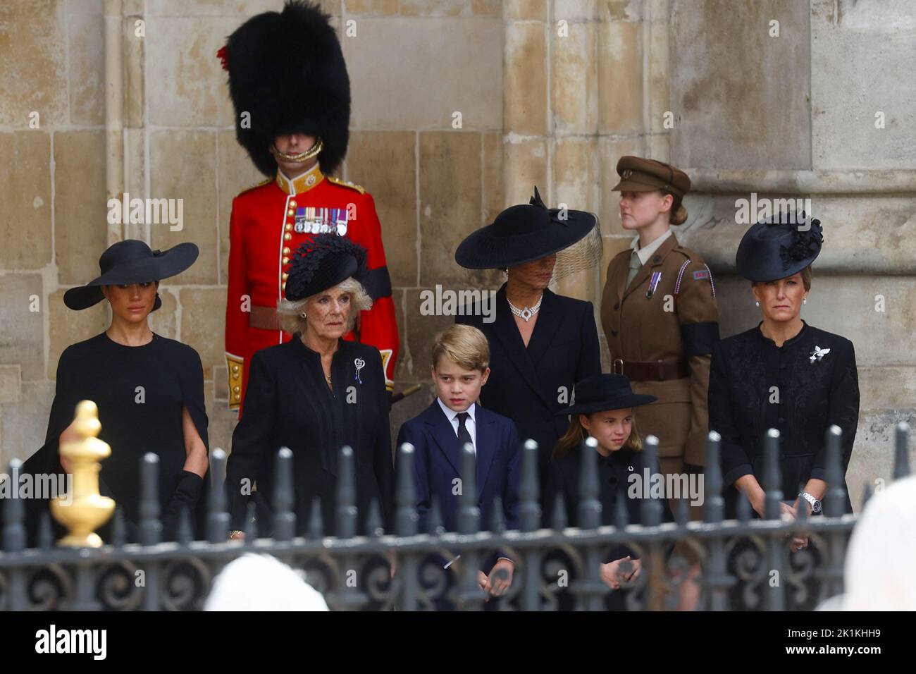 Britain's Queen Camilla along with Britain's Catherine, Princess of Wales, Britain's Meghan, Duchess of Sussex, Prince George and Princess Charlotte attend the state funeral and burial of Britain's Queen Elizabeth at Westminster Abbey, in London, Britain, September 19, 2022.  REUTERS/Kai Pfaffenbach Stock Photo