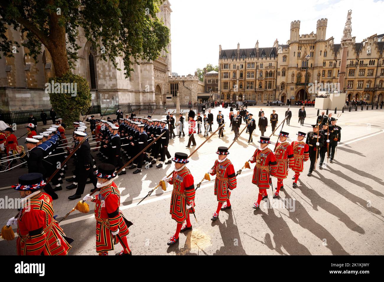 Yeomen of the Guard and Royal Navy service personnel march during the funeral procession from Westminster Abbey following the funeral service on the day of the state funeral and burial of Britain's Queen Elizabeth, in London, Britain, September 19, 2022 REUTERS/John Sibley Stock Photo