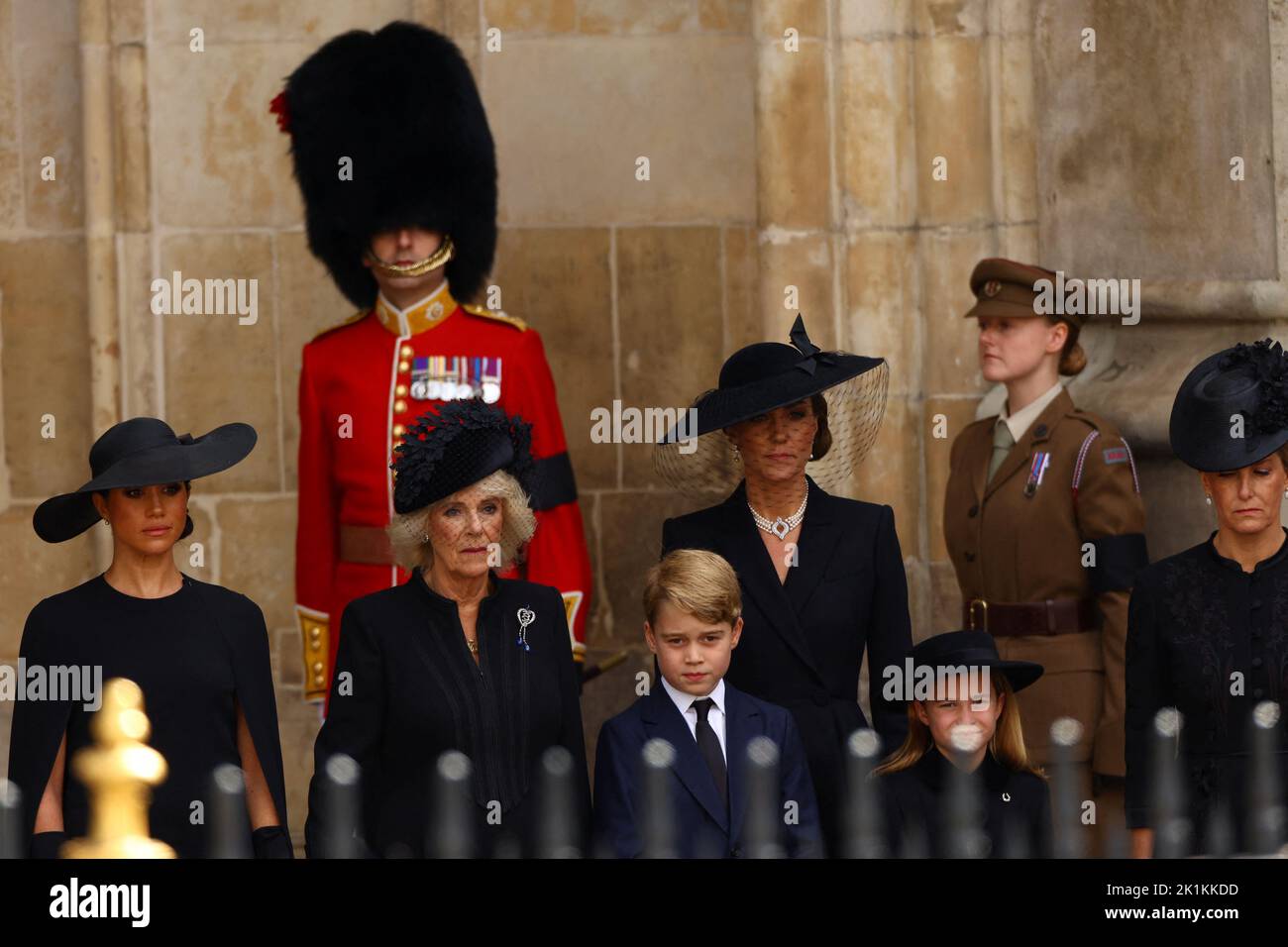 Britain's Queen Camilla, Britain's Catherine, Princess of Wales, Britain's Meghan, Duchess of Sussex, Prince George and Princess Charlotte attend the state funeral and burial of Britain's Queen Elizabeth at Westminster Abbey, in London, Britain, September 19, 2022.  REUTERS/Kai Pfaffenbach Stock Photo