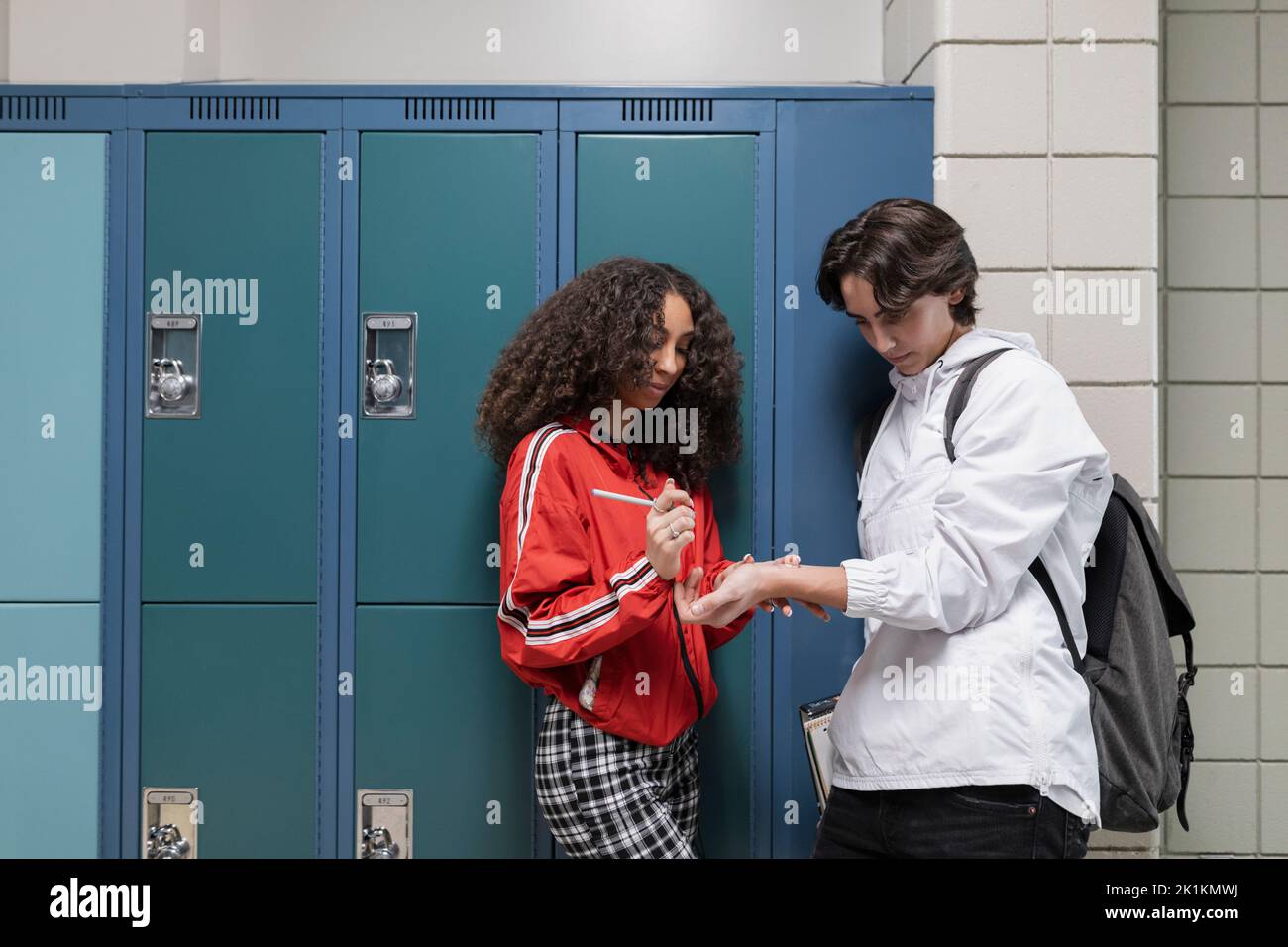 Teen hand writing hi-res stock photography and images - Alamy