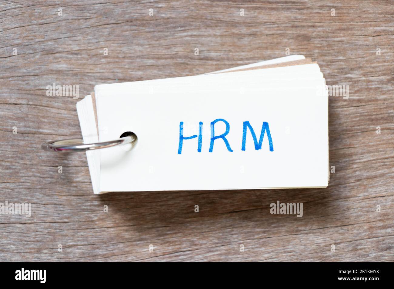 Flash card with handwriting in word HRM (Abbreviation of human resource