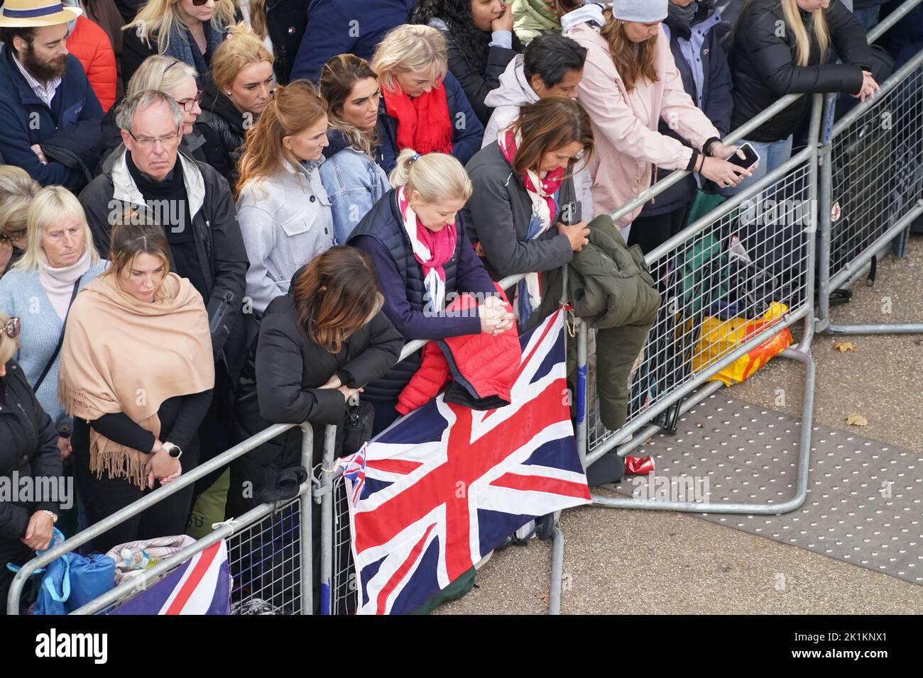 Members of the public are emotional during the State Funeral of Queen Elizabeth II, held at Westminster Abbey, London. Picture date: Monday September 19, 2022. Stock Photo