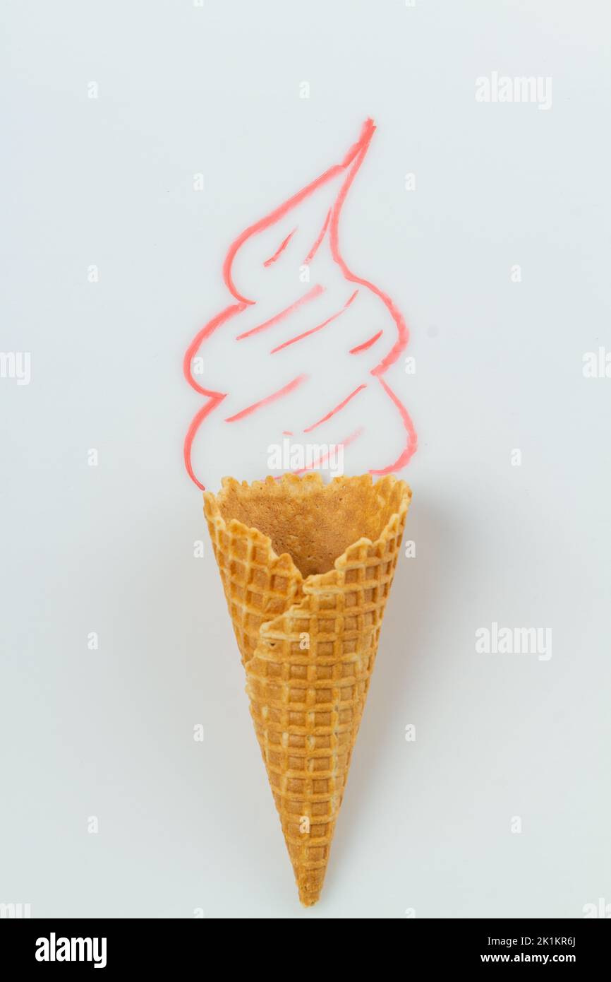 Ice cream with real waffle cone and hand drawn cream. Vertical shot white background. Stock Photo