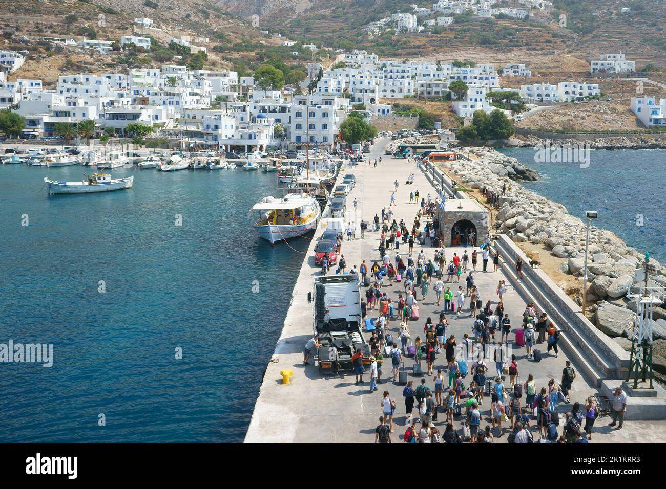 Travellers arraiving in Aigiali town and harbour, Amorgos, Cyclades, Aegean, Greek Islands, Greece, Europe Stock Photo
