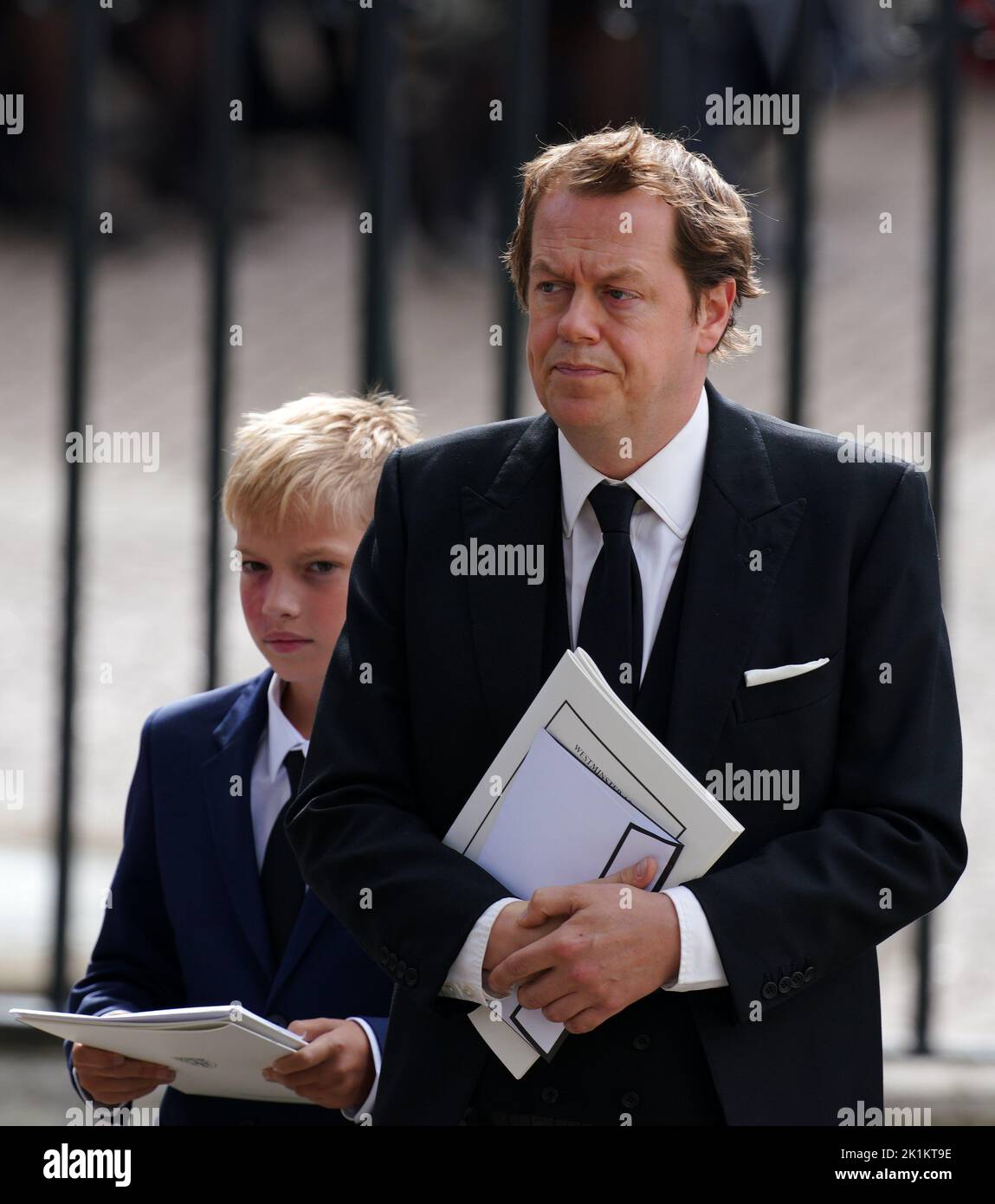 Tom Parker Bowles (right) leaving the State Funeral of Queen Elizabeth II, held at Westminster Abbey, London. Picture date: Monday September 19, 2022. Stock Photo