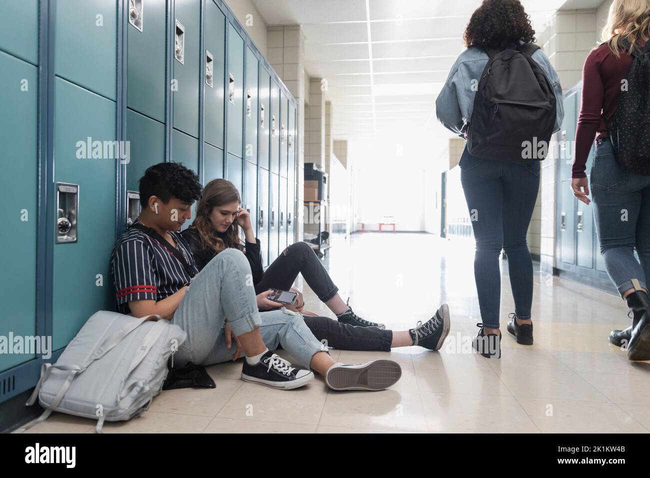 School teenager backpack lockers hi-res stock photography and images ...