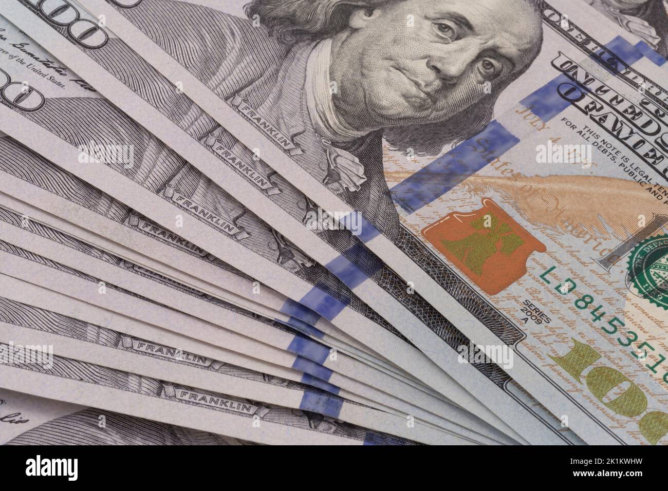 close up of pile of one hundred United States dollars banknotes Stock Photo