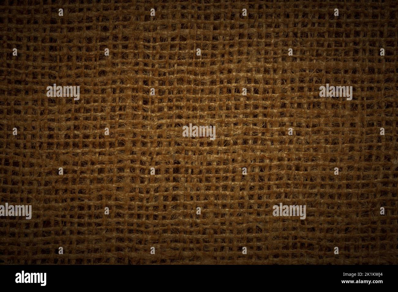 abstract rustic background: close up of dark brown burlap texture Stock Photo