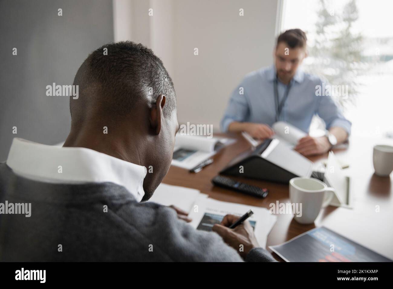 Two men meeting room hi-res stock photography and images - Alamy
