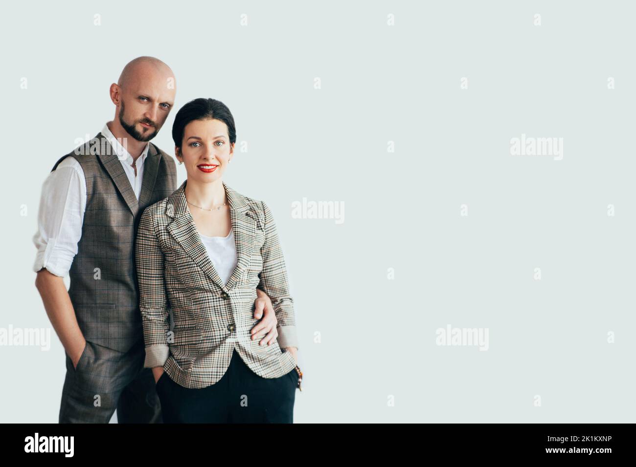 Smart casual elegance. Family look. Couple fashion style. Confident man