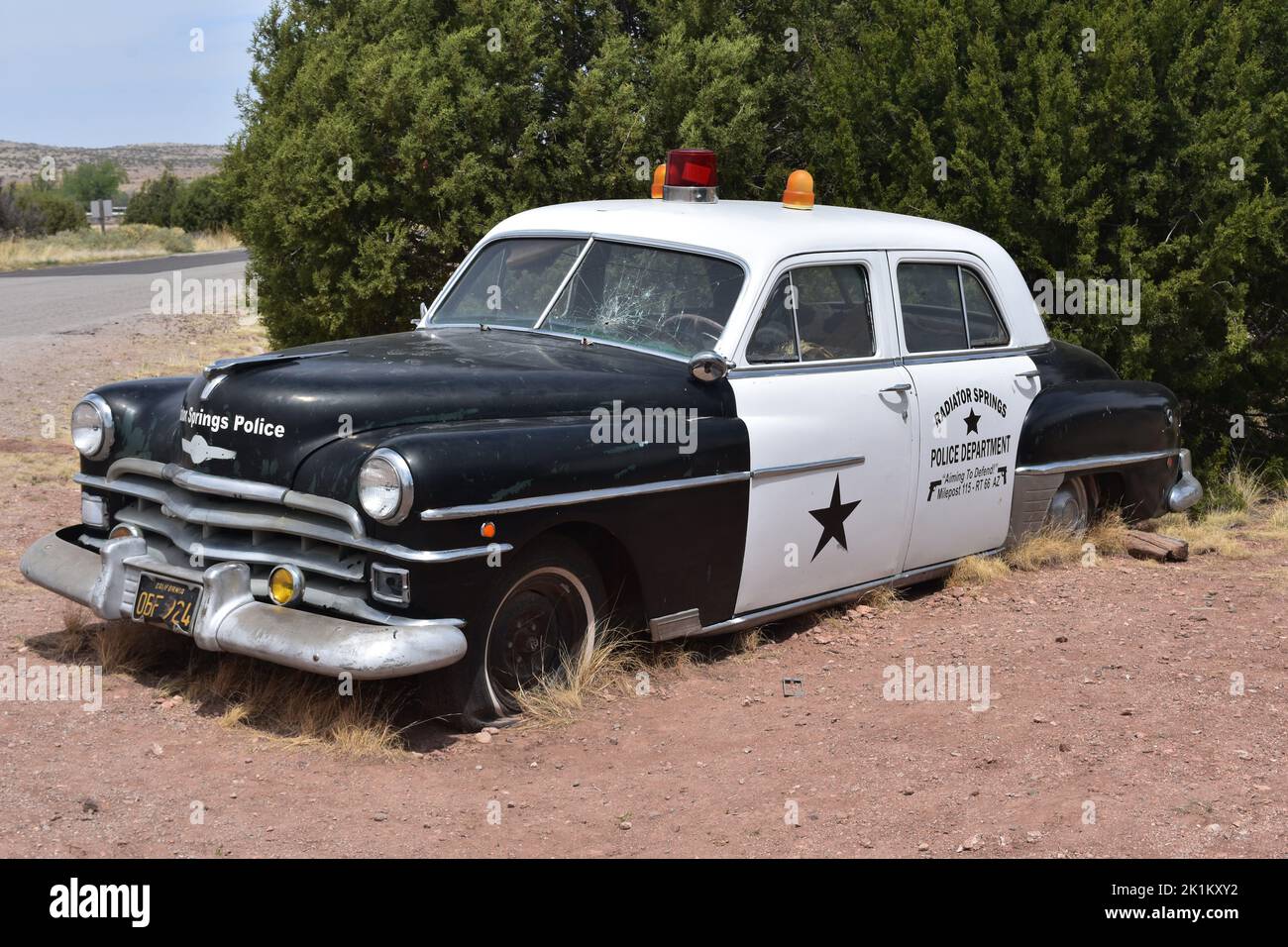 Old fashioned broken down police car in Arizona Stock Photo Alamy