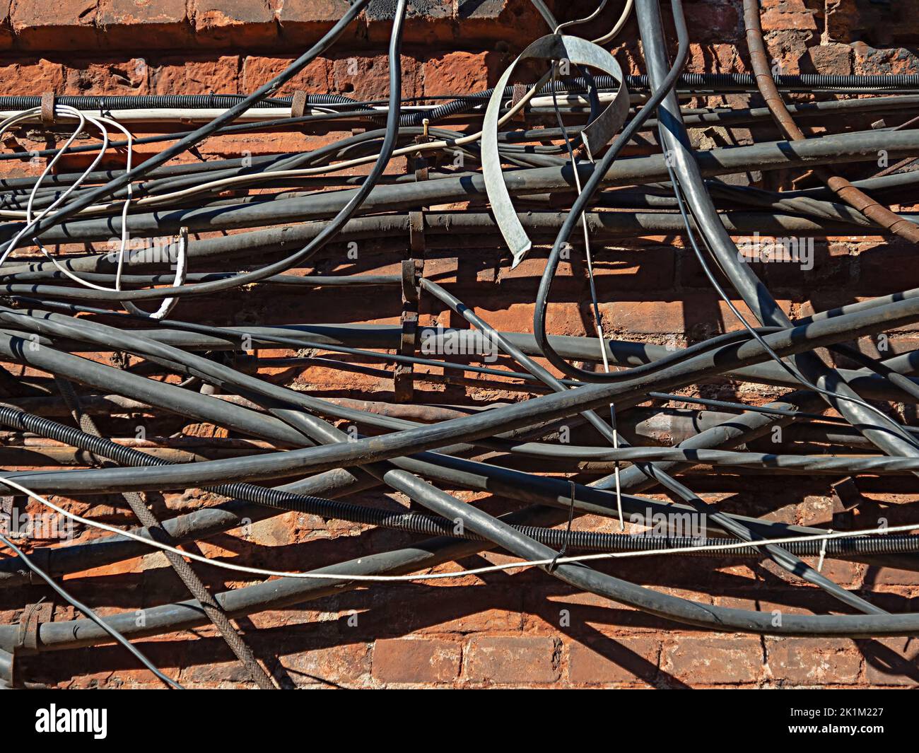 Attaching wires to wall hires stock photography and images Alamy