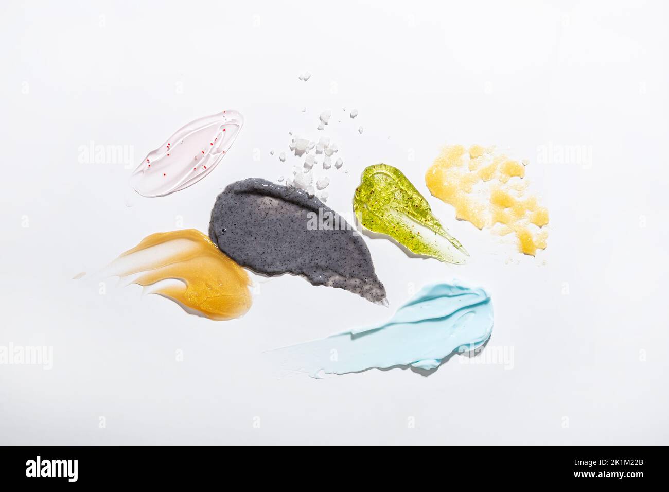Skincare cosmetic smears and swatches gel serum collagen emulsion top view Stock Photo