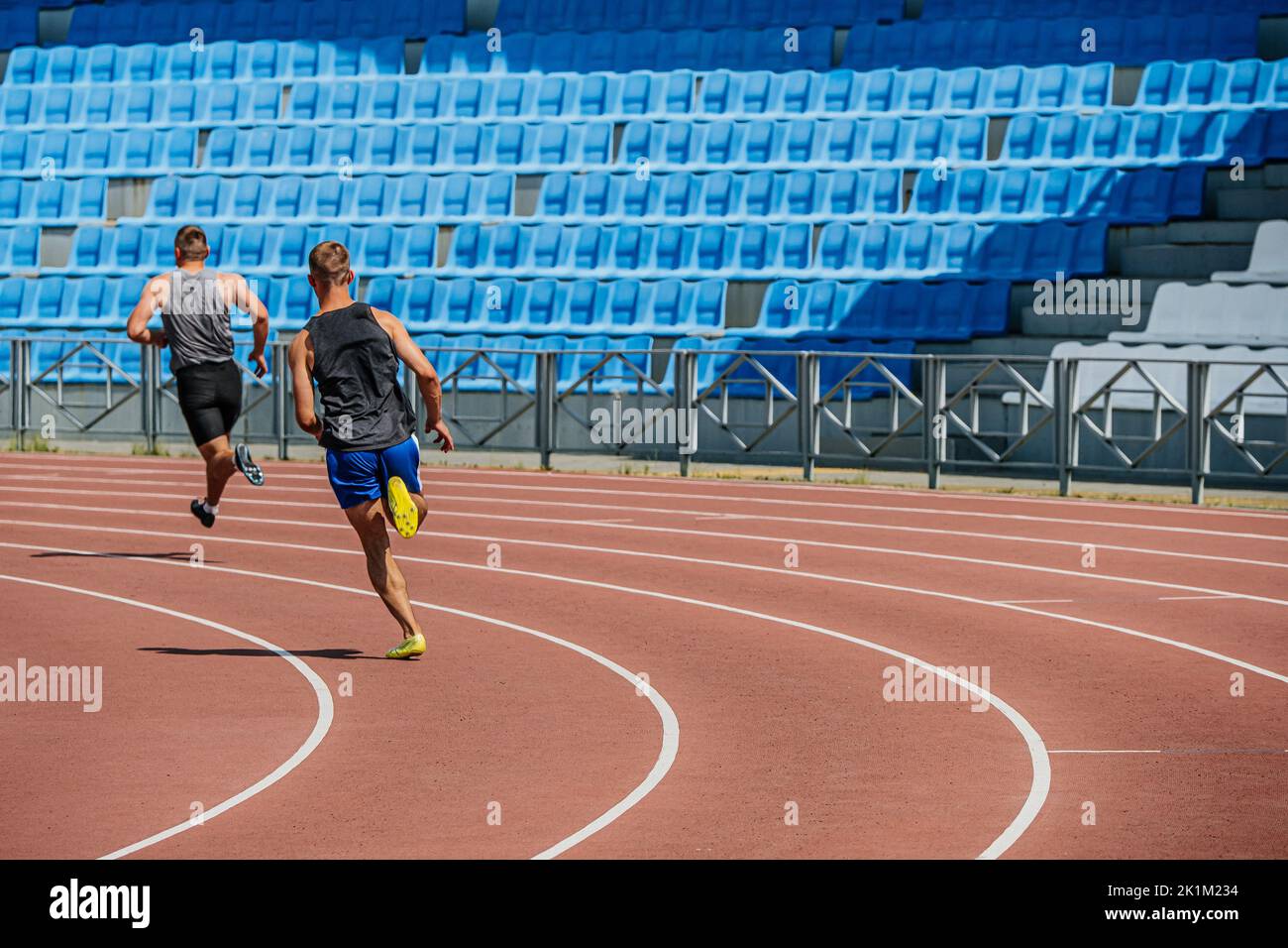 athletes runners running 400 meters race Stock Photo