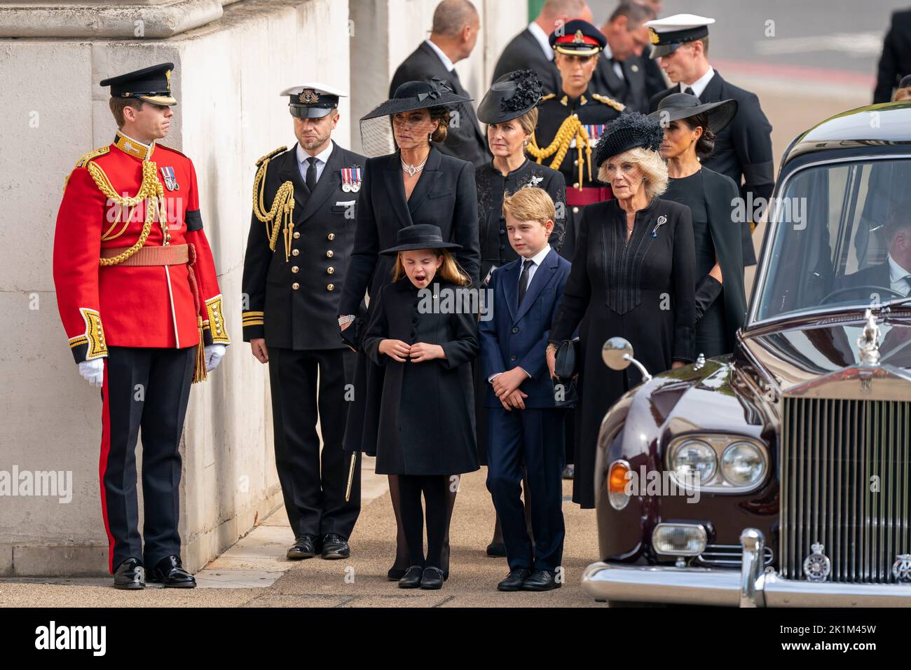Princess Charlotte, the Princess of Wales, the Countess of Wessex, Prince George, the Queen Consort and the Duchess of Sussex as the State Gun Carriage carrying the coffin of Queen Elizabeth II arrives at Wellington Arch during the Ceremonial Procession following her State Funeral at Westminster Abbey, London. Stock Photo