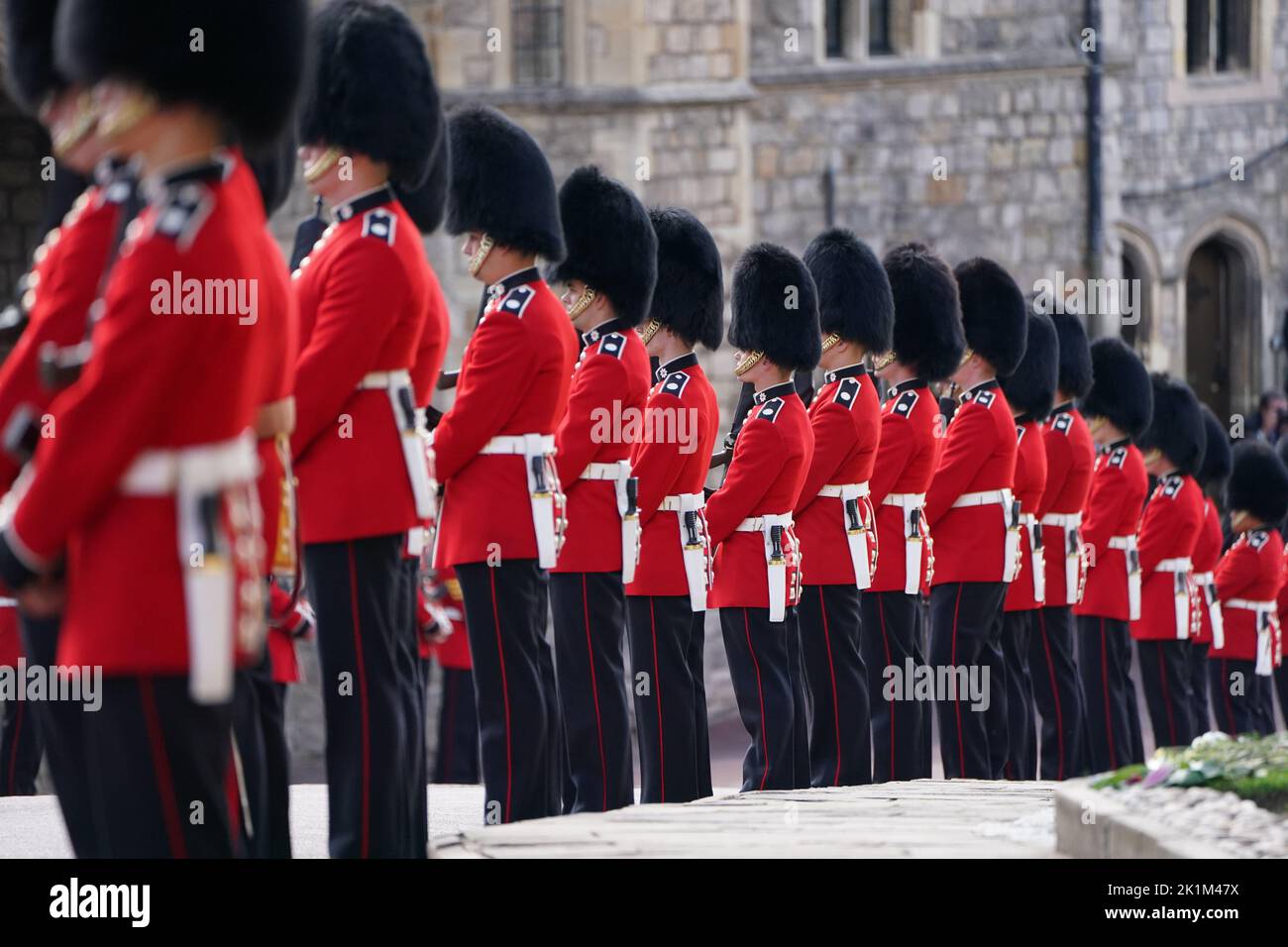Soldiers from the Grenadier Guards at Chapel Hill for the Committal Service for Queen Elizabeth II held at St George's Chapel in Windsor Castle, Berkshire. Picture date: Monday September 19, 2022. Stock Photo
